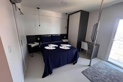 Katil atau katil-katil dalam bilik di Apartamento no 9º Andar com Vista Privilegiada para o Mar