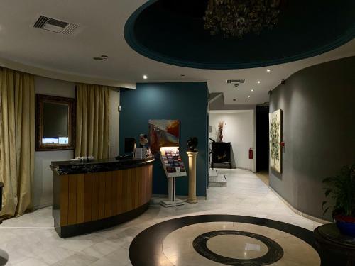 TV a/nebo společenská místnost v ubytování Art Hotel Athens