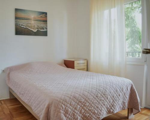 Ένα ή περισσότερα κρεβάτια σε δωμάτιο στο House Mili