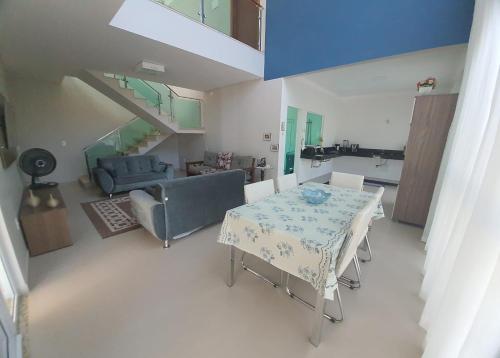 Khu vực ghế ngồi tại Casa Entre Verde e Mar Praia do Mariscal