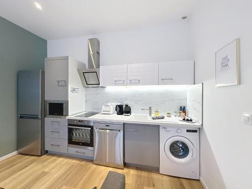 Le Sacré - Appartement rare - Cour privée - Parking - Reims