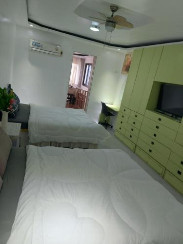 Katil atau katil-katil dalam bilik di Room Calapan