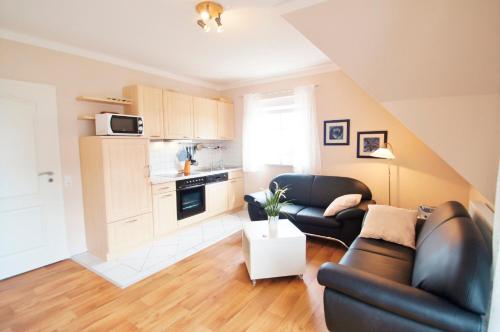 Kuchyň nebo kuchyňský kout v ubytování Haus Swantje - Fewo 2