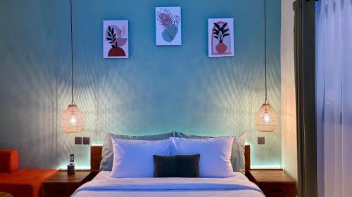 Ένα ή περισσότερα κρεβάτια σε δωμάτιο στο Vibo Studio Seminyak