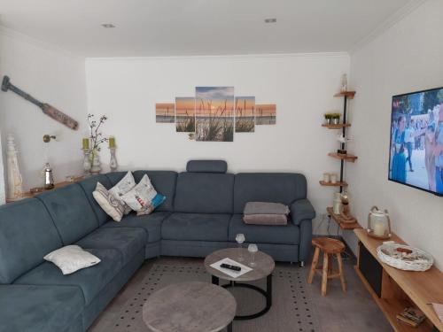 Posezení v ubytování Bungalow 6091 in Tossens