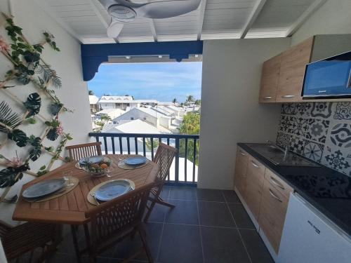 Køkken eller tekøkken på Duplex entre mer et golf