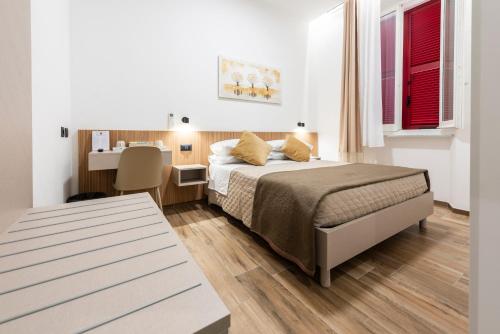 Postel nebo postele na pokoji v ubytování CHD Rooms