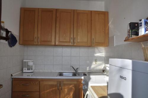 Kuchyň nebo kuchyňský kout v ubytování Apartment Petar