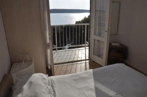 Postel nebo postele na pokoji v ubytování Apartment Petar