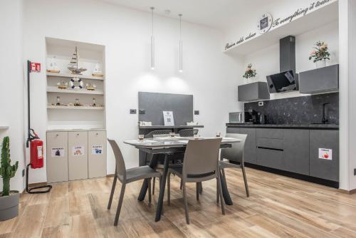Kuchyň nebo kuchyňský kout v ubytování CHD Rooms