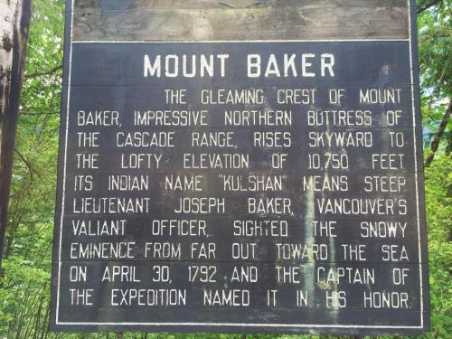 a sign for a mountain baker in the forest at Glacier Springs Cabin 12 - Wi-Fi - A-C - Evc in Glacier