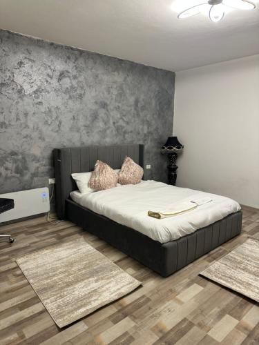 Postel nebo postele na pokoji v ubytování Mario apartament