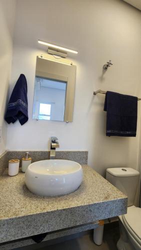 a bathroom with a sink and a toilet at Morada City Hostel in Sao Paulo