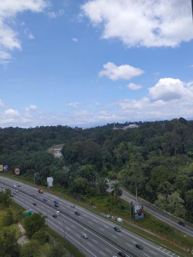 an overhead view of a highway with cars on it at The Luxe Lodge in Southville City in Bangi