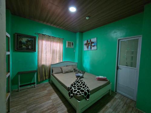 Postel nebo postele na pokoji v ubytování Airusxander Beach Resort