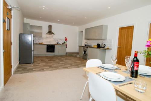 Køkken eller tekøkken på The Penthouse at Bridge Apartments