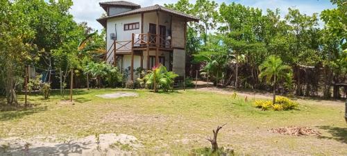 En have udenfor Moana Flat bungalow térreo pertinho da praia