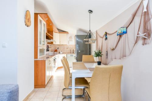 Apartments by the sea Trogir - 23836