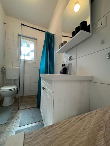 Ένα μπάνιο στο Apartman Pupi