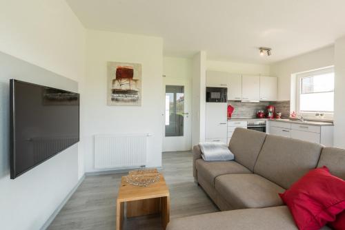 Η κουζίνα ή μικρή κουζίνα στο Ferienhaus 4827 in Tossens