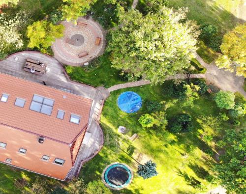 an overhead view of a building with a yard at Haus Irsa in Over de Dijk