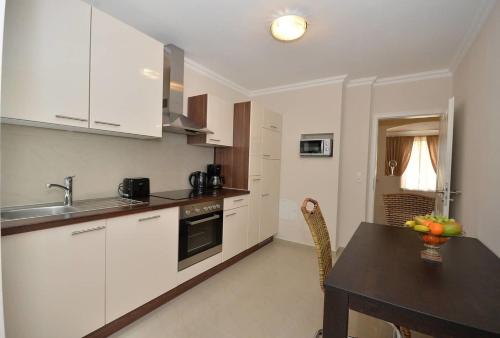 Cuisine ou kitchenette dans l'établissement Business Apartments Bremen Typ 2