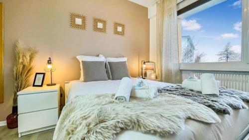 Photo de la galerie de l'établissement HOMEY LA COLOC MUGI - Colocation haut de gamme - Chambres privées - Balcon - Wifi et Netflix - Proche transports commun, à Annemasse