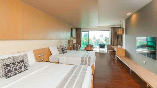 Postel nebo postele na pokoji v ubytování Phuket Graceland Resort and Spa
