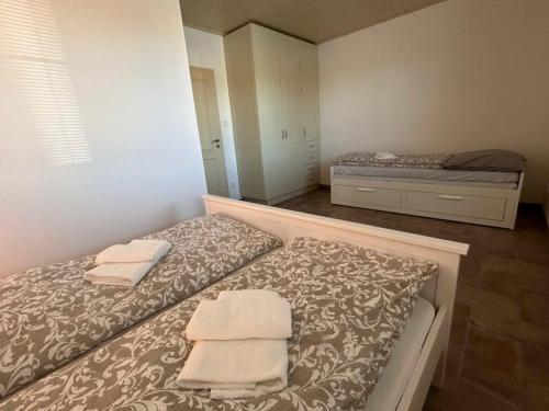 Apartmány Airoloにあるベッド