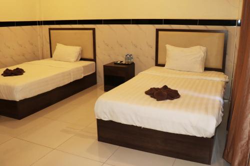 Katil atau katil-katil dalam bilik di AHHA Residence Kampot