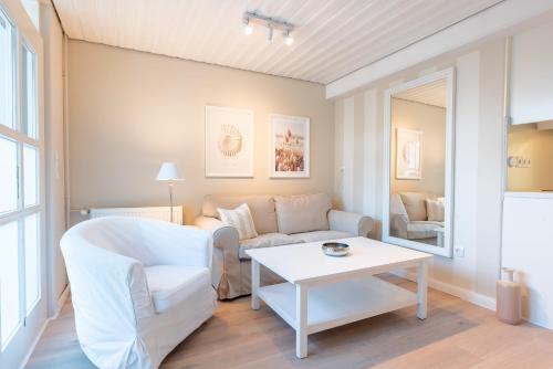 Posezení v ubytování Landhaus am Meer - Whg 2 Süderaue