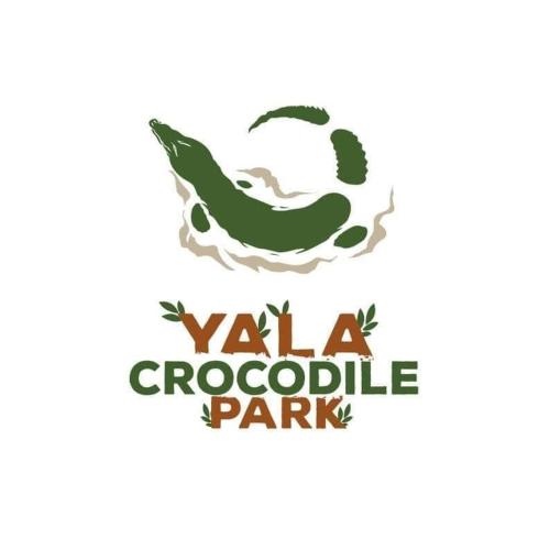 a park logo with the words vale crocodile park at Crocodile park Bungalow in Kataragama