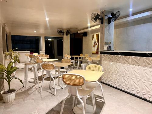 a row of tables and chairs in a restaurant at La Palme in El Nido
