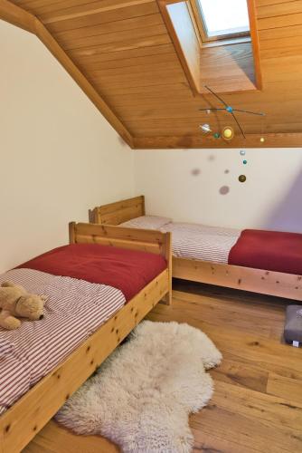 Katil atau katil-katil dalam bilik di Chesa Valluna - La Punt-Chamues-ch
