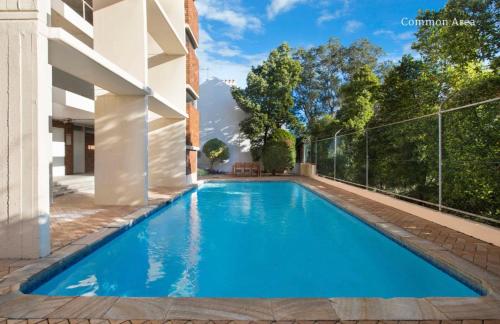 a swimming pool in the backyard of a house at Paddington chic at Five Ways in Sydney