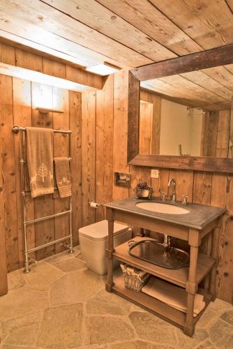 a bathroom with a sink and a toilet at Chesa Platz - Bever in Bever