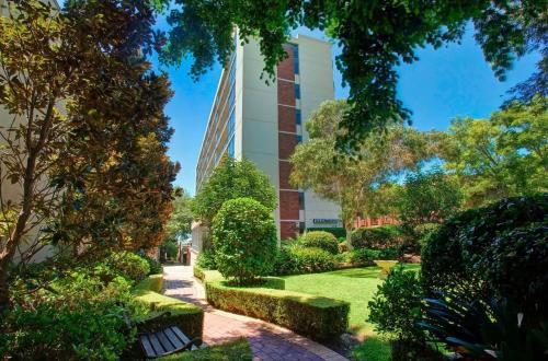 a view of the building from the garden at Paddington chic at Five Ways in Sydney