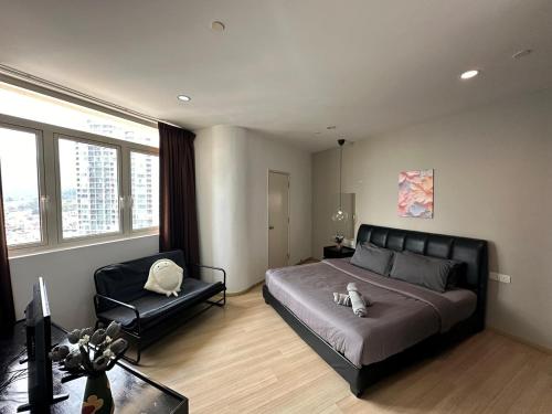 Postel nebo postele na pokoji v ubytování Comfort 1BR studio One One Eight Island Plaza
