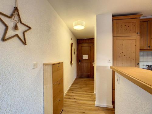 a kitchen with a star hanging on the wall at Rancho 217 in Verbier