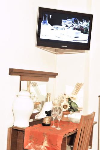 TV a/nebo společenská místnost v ubytování Albergo Romagna