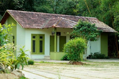 Zahrada ubytování Ayurnest Pool Resort Wayanad