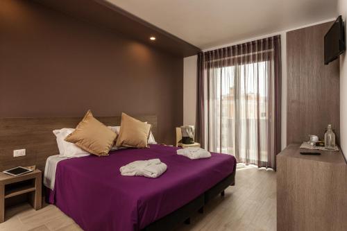 Hotel Gioiaにあるベッド