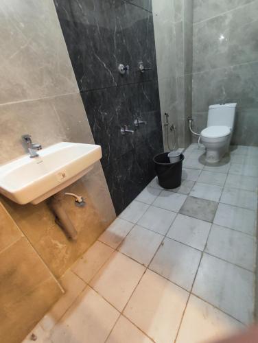 Salle de bains dans l'établissement Shree Ramalinga Residency