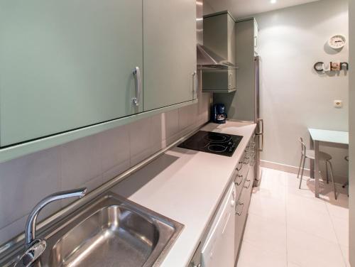 a kitchen with a sink and a counter top at Earra - Eder, 3 min. playa y en pleno centro in Zarautz