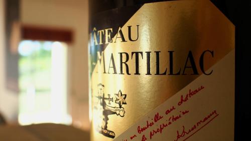 a bottle of wine with the words imperial maritarian on it at Domaine de Gorre in Martillac
