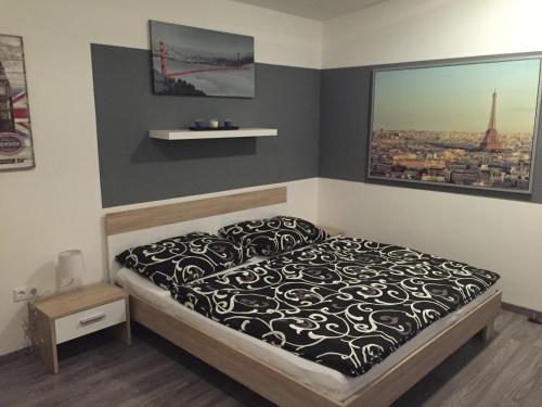 Voodi või voodid majutusasutuse Penzion Hirmann toas