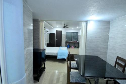 Cama o camas de una habitación en Canara Vibes