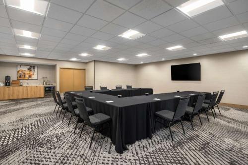 a conference room with a long table and chairs at Homewood Suites by Hilton San Diego Airport-Liberty Station in San Diego
