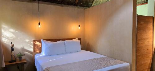 Hotel Kin Tulum IIにあるベッド