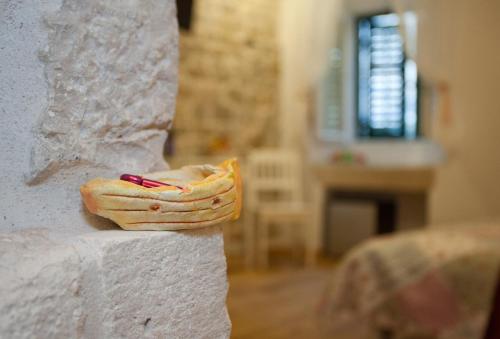 a hot dog sitting on the side of a wall at Luxury Room Kokola in Split
